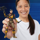 A person holding up their custom Scarlett Selfie Series action figure.
